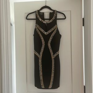 Black High neck Dress with embellishments by Bebe